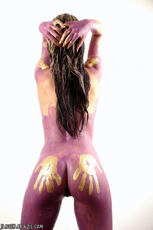 dark-haired woman with violet and golden body paint; Ass Female Friendly Stylish 